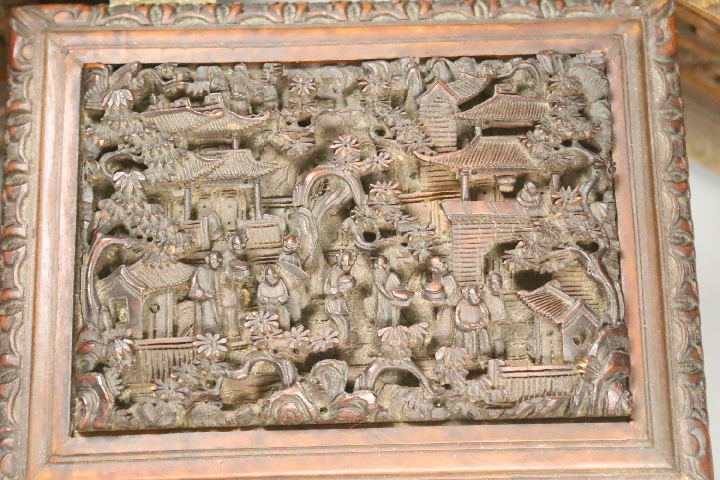 Three Chinese carved hardwood caskets, largest 19 x 15cm 13cm high